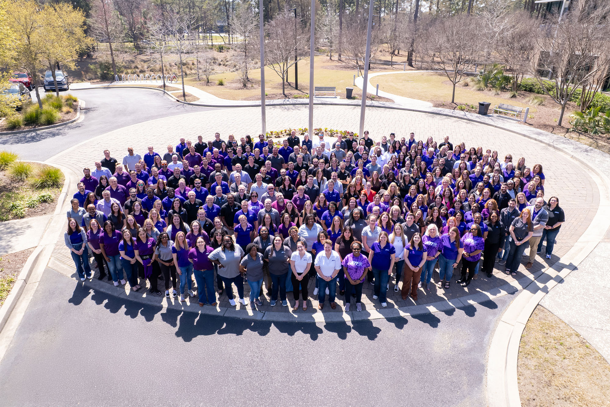 ATI_Group Photo – ATI white logo Working AT ATI